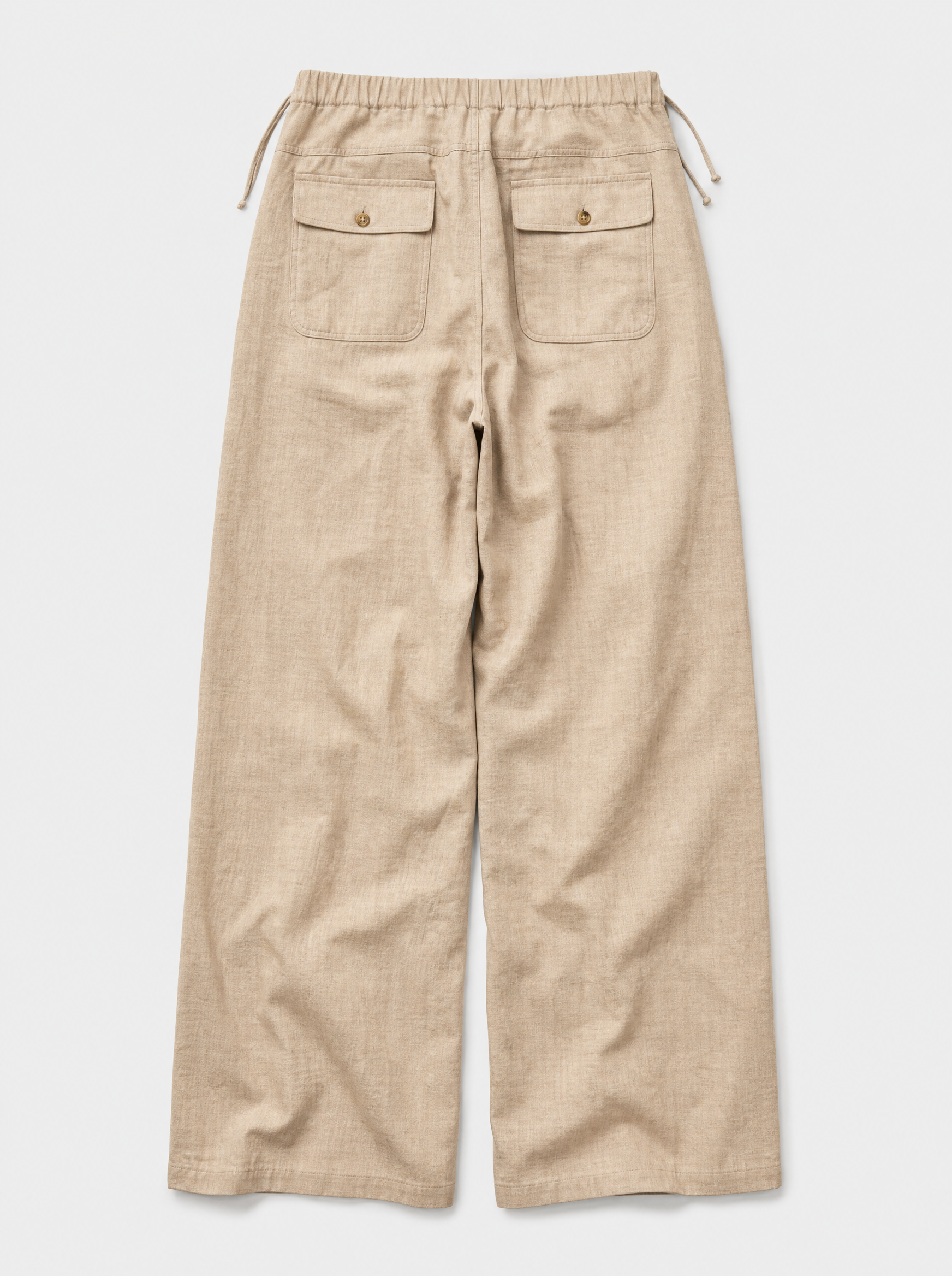 The Bastia Trouser — sand linen-cotton wide-leg drawstring trouser, back view