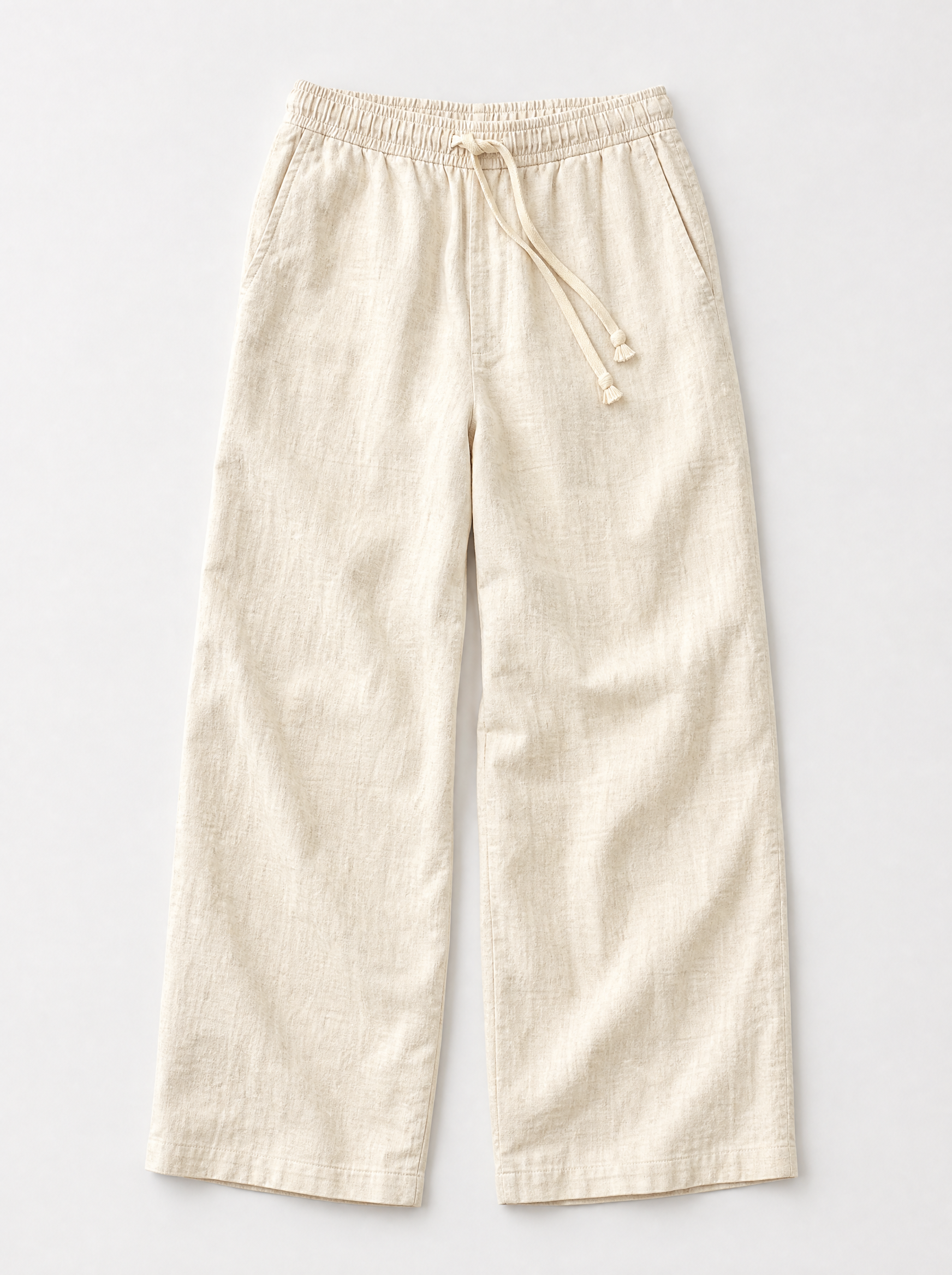 The Bastia Trouser — ivory linen-cotton wide-leg drawstring trouser, front view