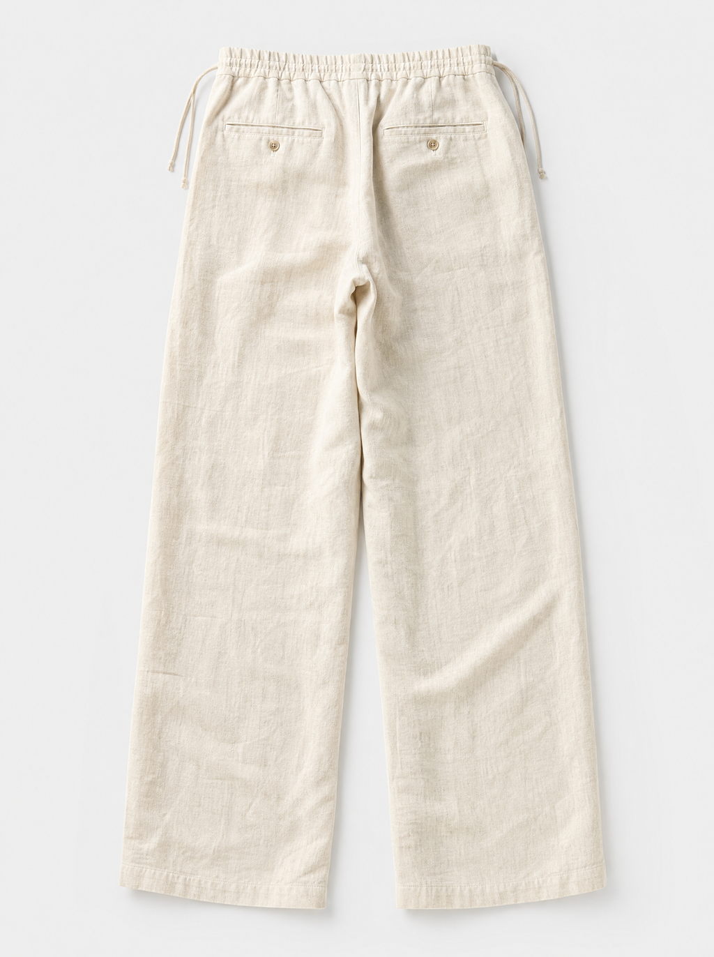 The Bastia Trouser — ivory linen-cotton wide-leg drawstring trouser, back view
