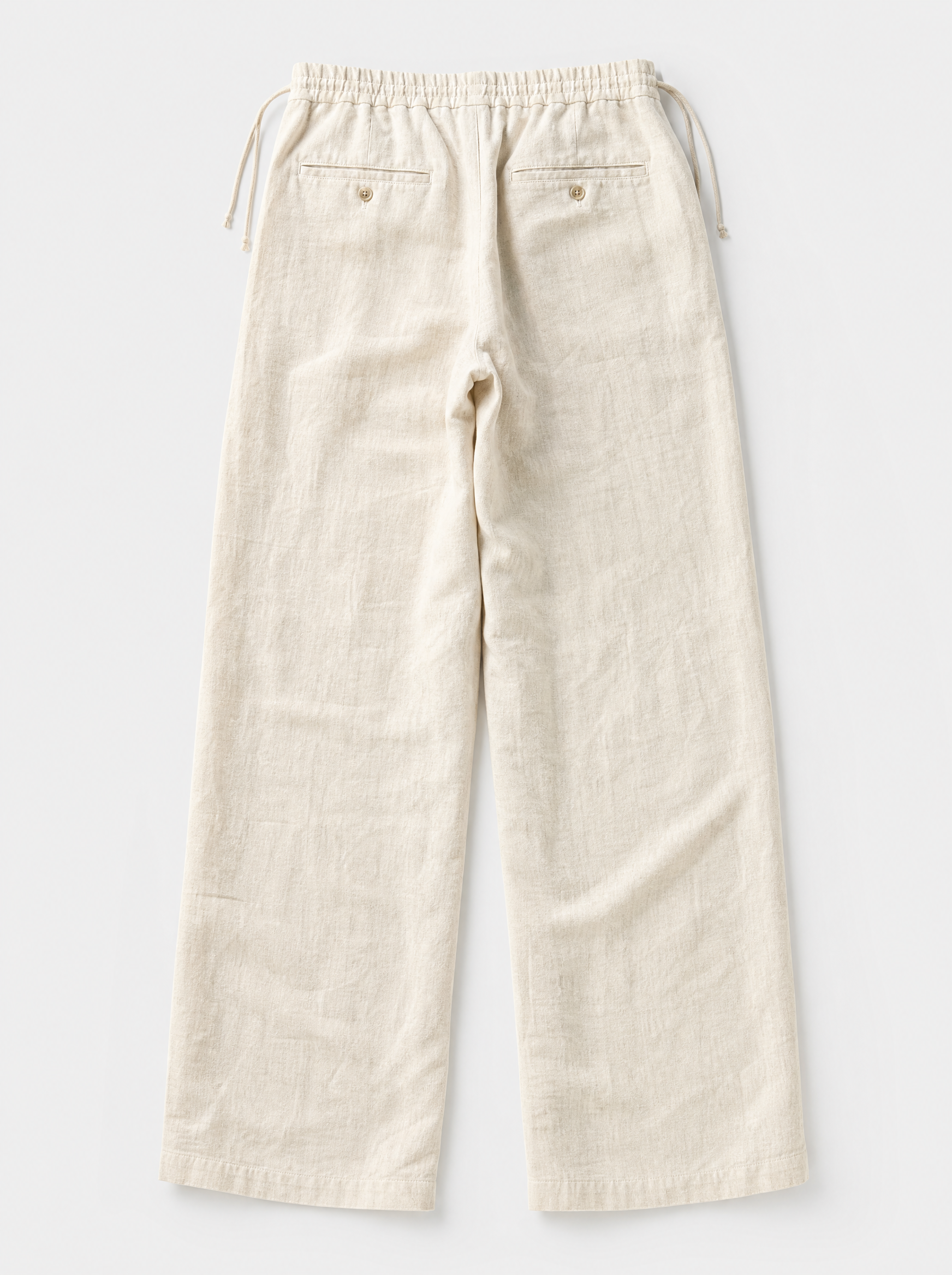 The Bastia Trouser — ivory linen-cotton wide-leg drawstring trouser, back view