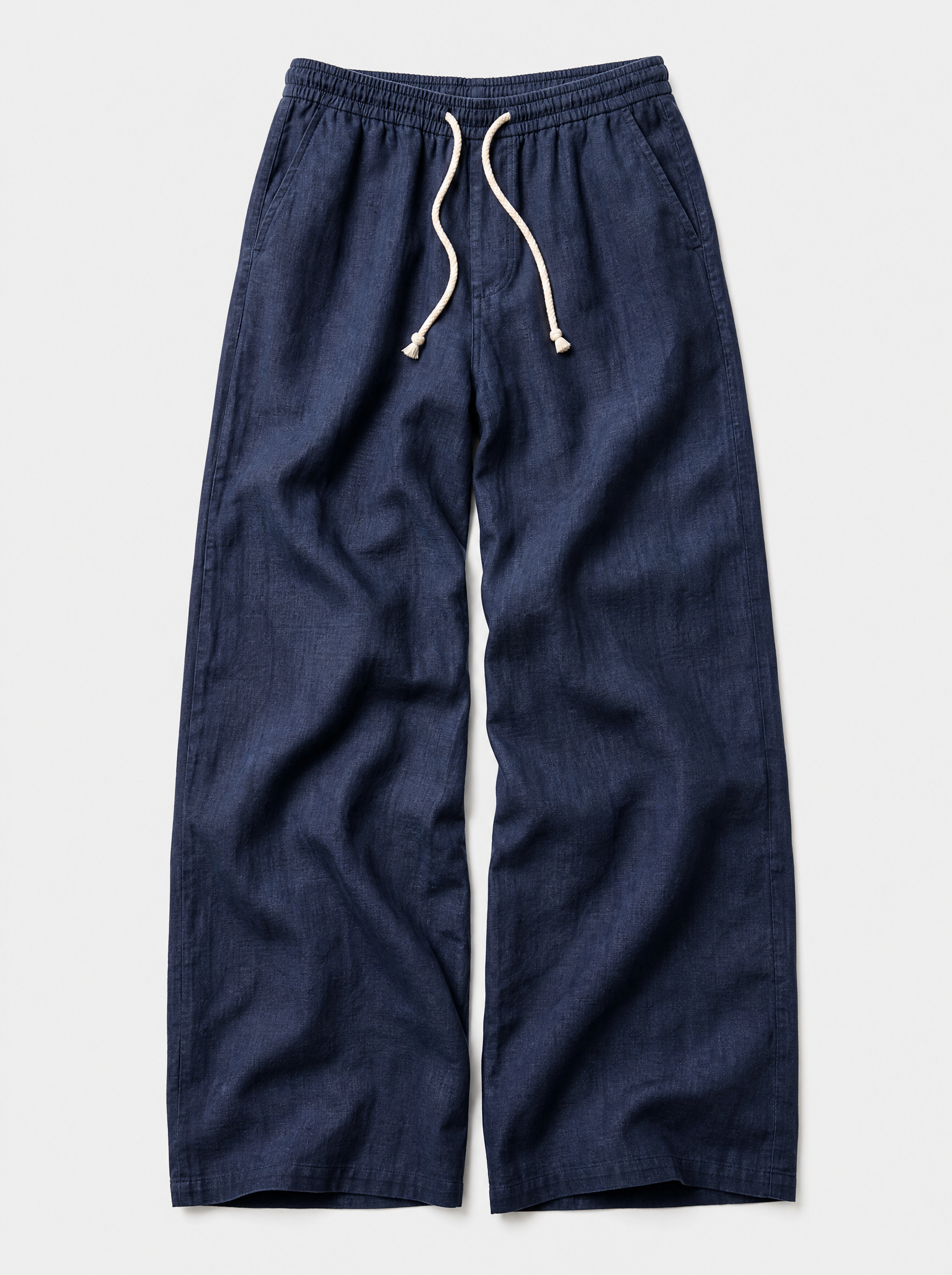 The Bastia Trouser — navy linen-cotton wide-leg drawstring trouser, front view