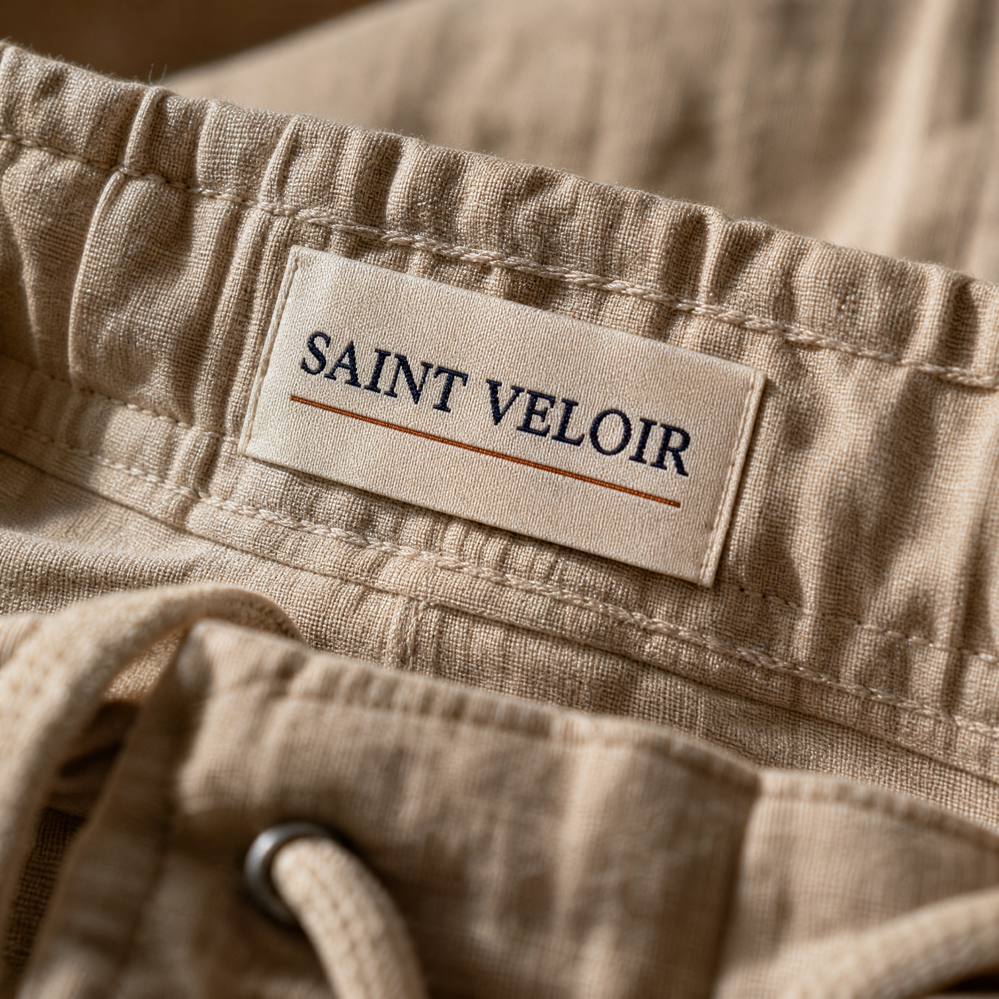 Saint Veloir woven label inside the waistband of The Bastia Trouser