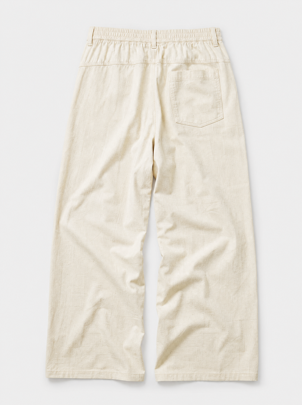 The Procida Pant — ivory cotton-hemp wide-leg drawstring beach pant, back view