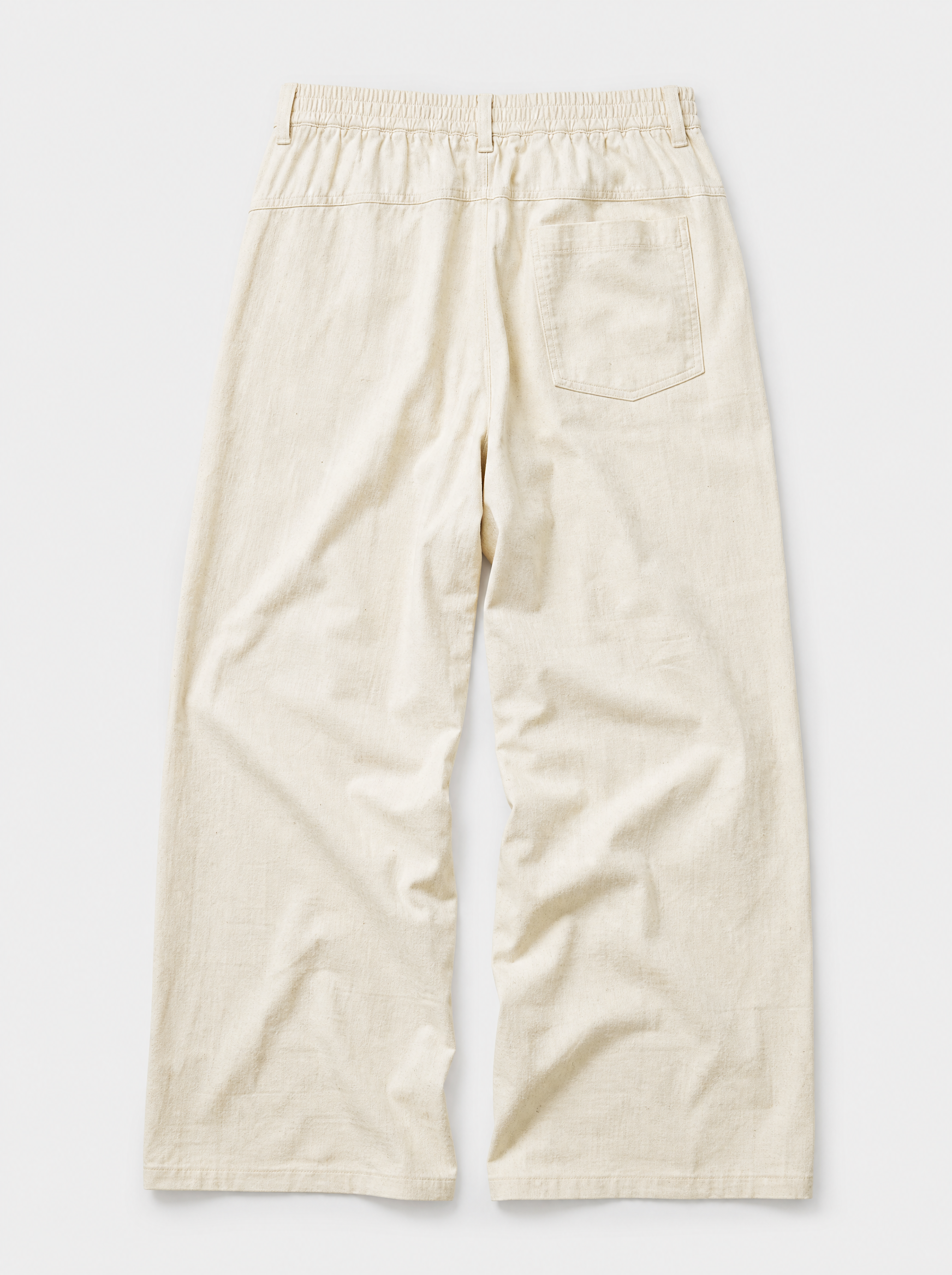 The Procida Pant — ivory cotton-hemp wide-leg drawstring beach pant, back view