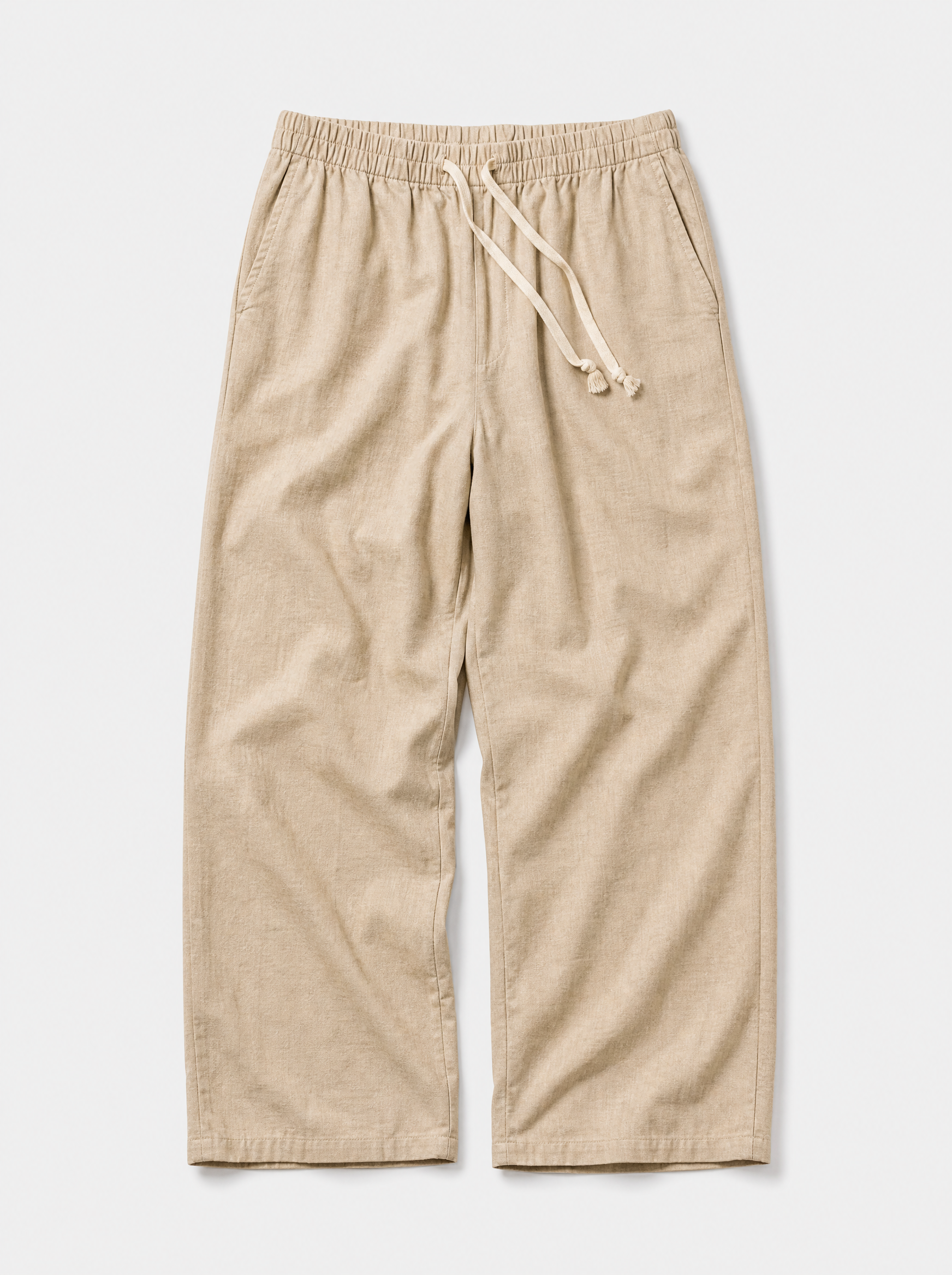 The Procida Pant — sand cotton-hemp wide-leg drawstring beach pant, front view