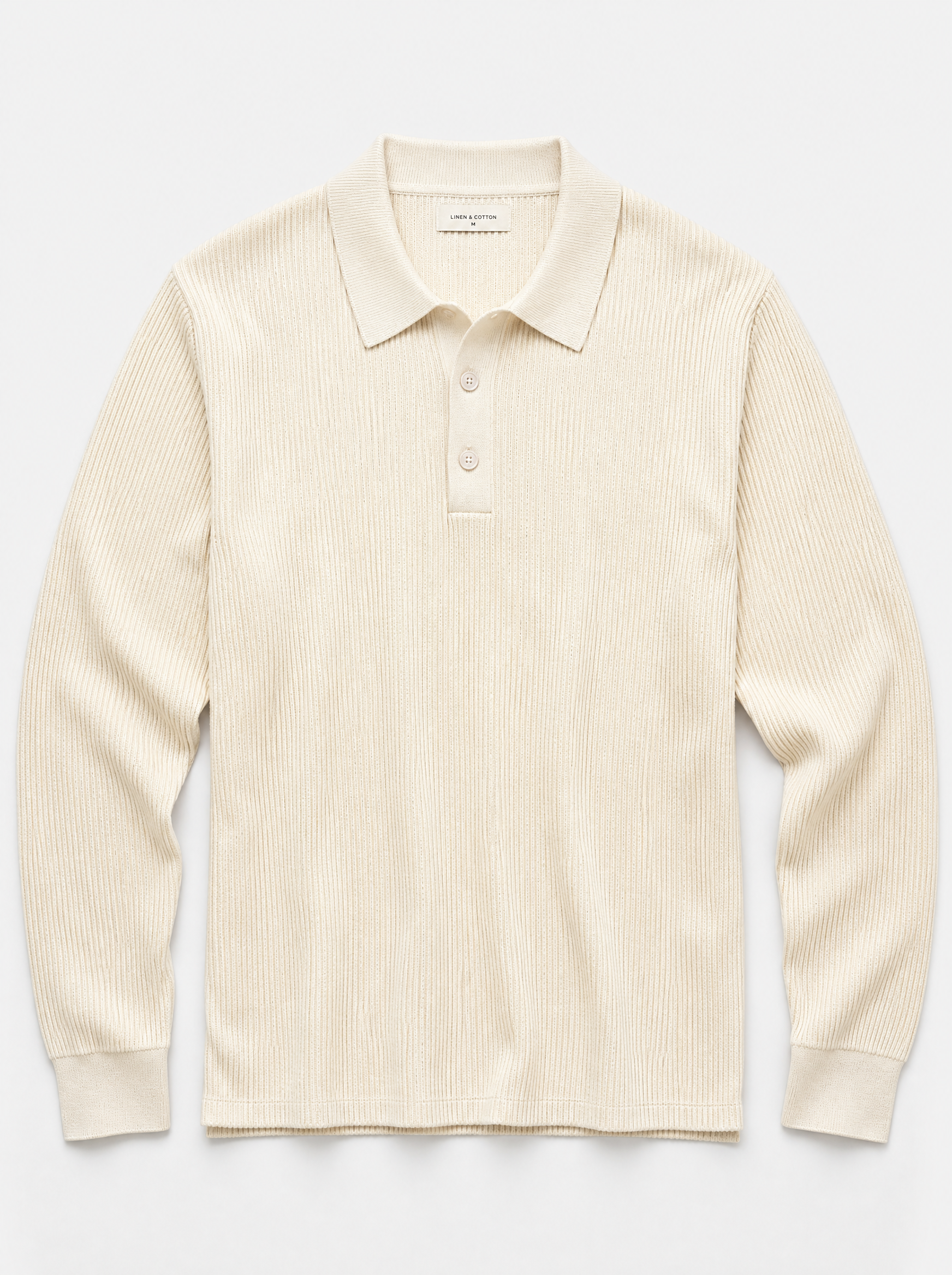 The Trani Polo — ivory ribbed knit cotton long-sleeve polo, front view