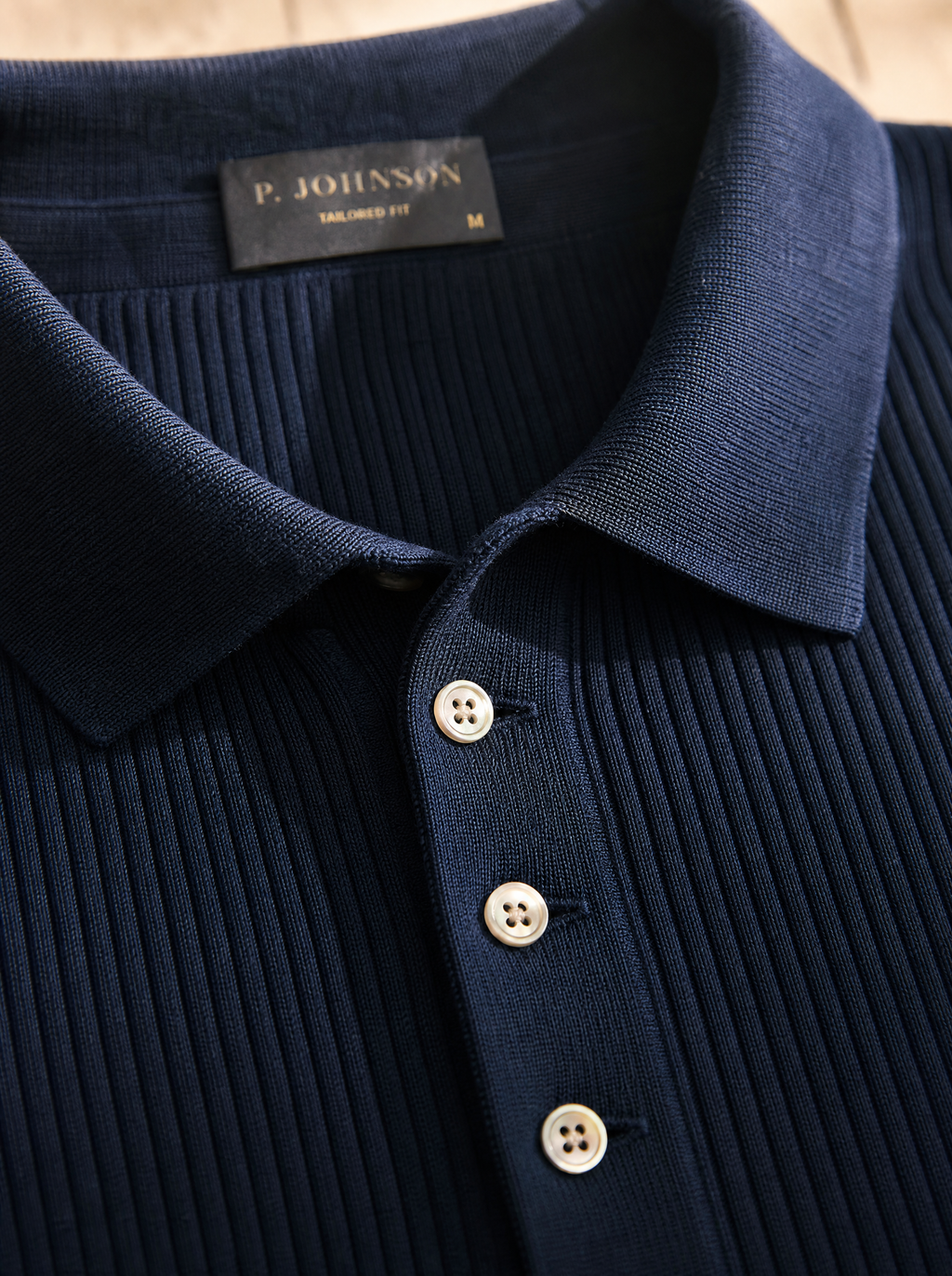 Collar and three-button placket detail — The Trani Polo