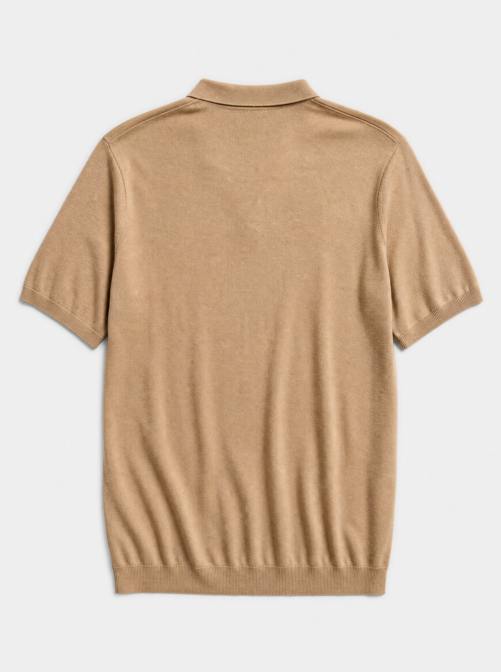 The Portofino Polo — sand fine-gauge knit cotton short-sleeve henley polo, back view